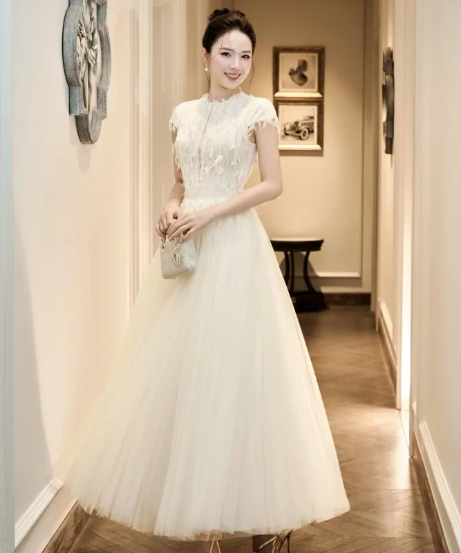 Váy trắng đắp ren HOCHIC